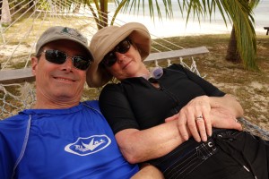 Life's a beach - the young couple enjoying the hammock after a swim and snorkel