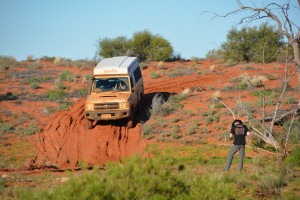 John and Kathy negotiating a short deep dip in the loose red sand