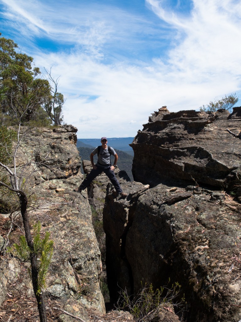 Straddling a deep crevasse overlooking Capertee Valley