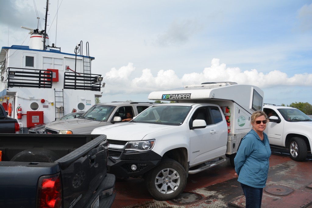 Crossing the mighty Mississippi not by an eight lane bridge but by a small 12 car ferry