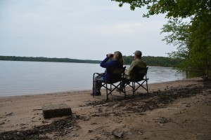 Enjoying our traditional cocktail hour on our private little beach on Jordan Lake in central North Carolina