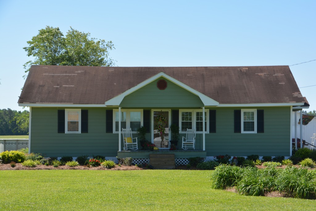 Even a modest home has a porch and on it will be rocking chairs 