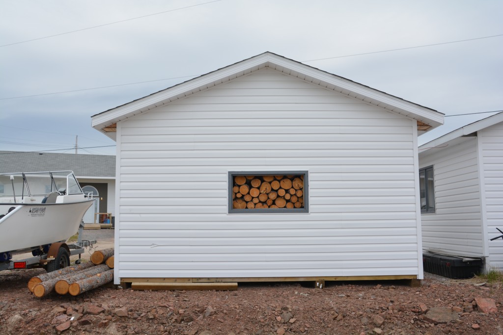 Last winter the boat was in and the wood was out - this winter we're swapping it