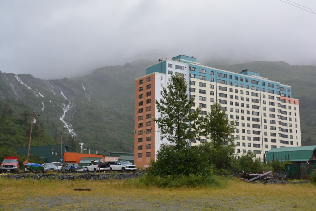 The beautifully positioned but remote town of Whittier where most of its 200 residents live in this single building