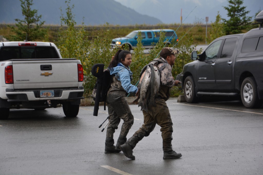 This couple hauls back their catch for the day - probably half a dozen beautiful silver salmon, beautiful for eating