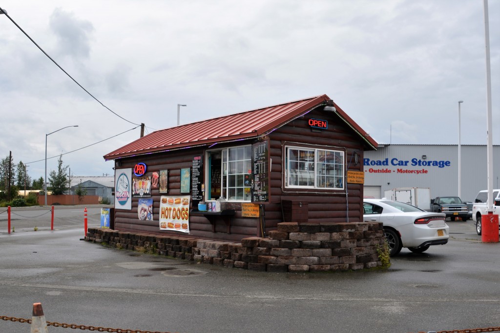 Anchorage highlights one of the great Alaskan features - drive-through coffee huts. This one is made of logs and also sells other food.