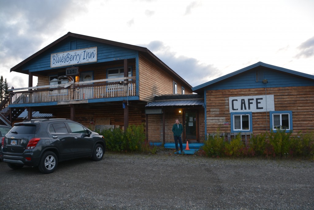 Julie admiring the Bluesberry Inn - never mind the weeds and the cafe that has never opened